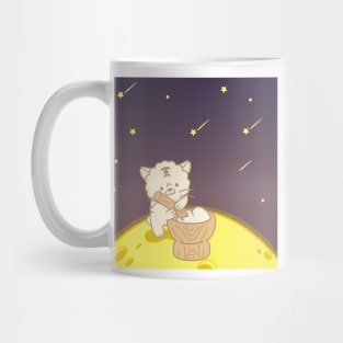 A cute cat making rice cake on the moon Mug